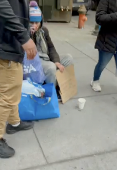 Kyle Smith, AGA Philadelphia Chapter President, feeding the homeless in Philadelphia